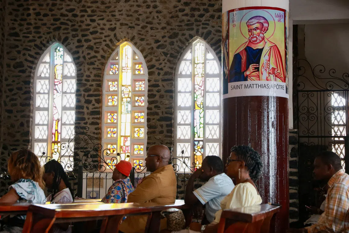 Catholic worshippers celebrate Mass at the Cathedral of Our Lady of Victories in Yaounde, Cameroon, April 12, 2026. REUTERS/Durel Epoh