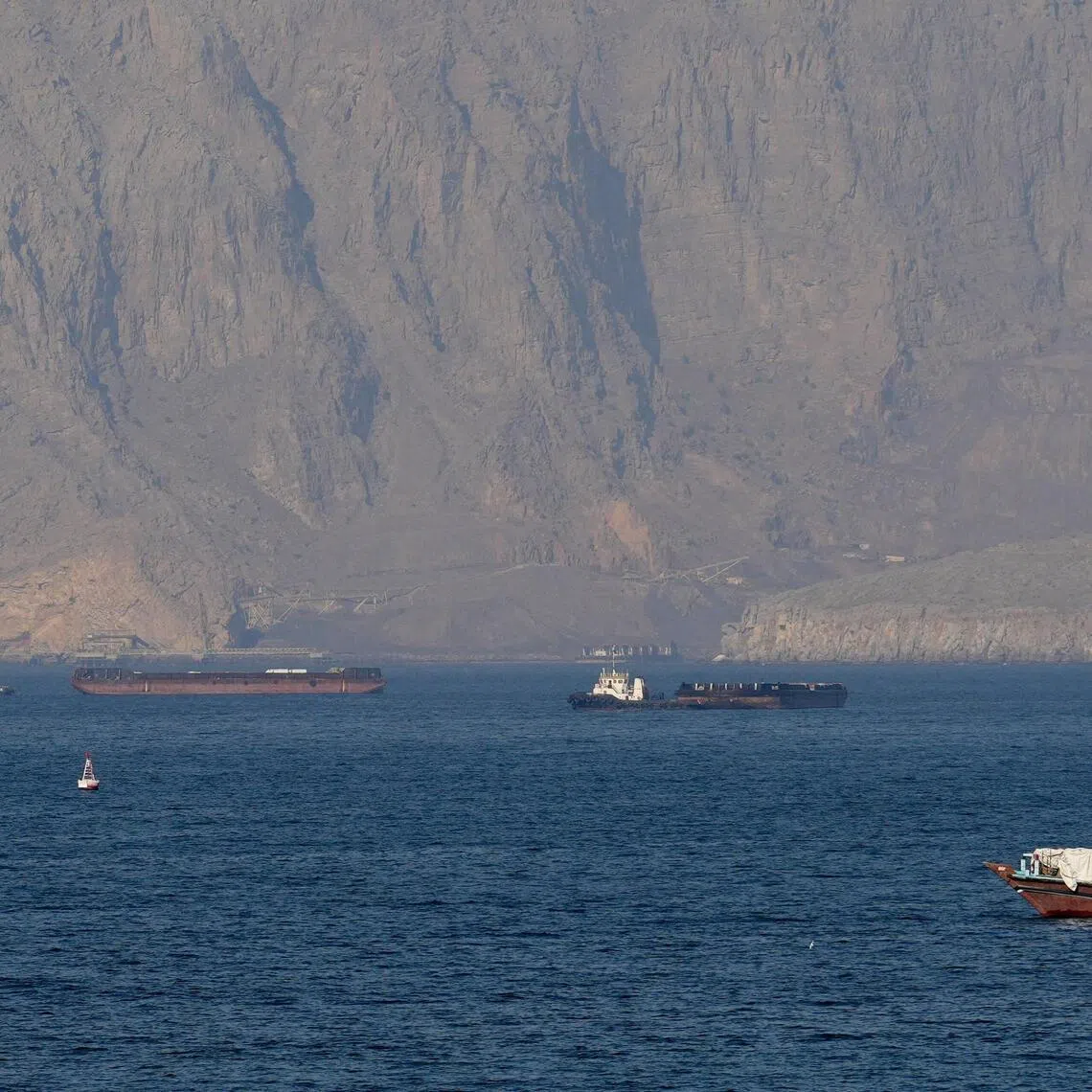 Ships and tankers in the Strait of Hormuz off the coast of Musandam, Oman, April 18, 2026. REUTERS/Stringer REFILE - QUALITY REPEAT/File Photo