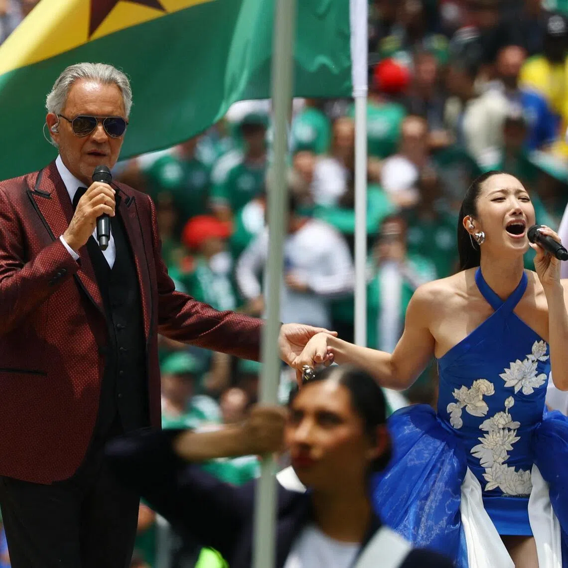 Singers Andrea Bocelli (left) and Ejae performing during the pre-game show before the opening match of the FIFA World Cup 2026 between Mexico and South Africa in Mexico City, Mexico, June 11 June, 2026.
