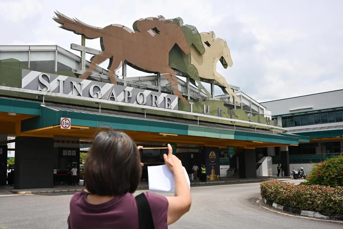 Visitor taking photos of the entrance of Singapore Turf Club on Oct 5, 2024. The Singapore Turf Club will be hosting its final race before it closes its doors  on Oct 5, 2024.. 