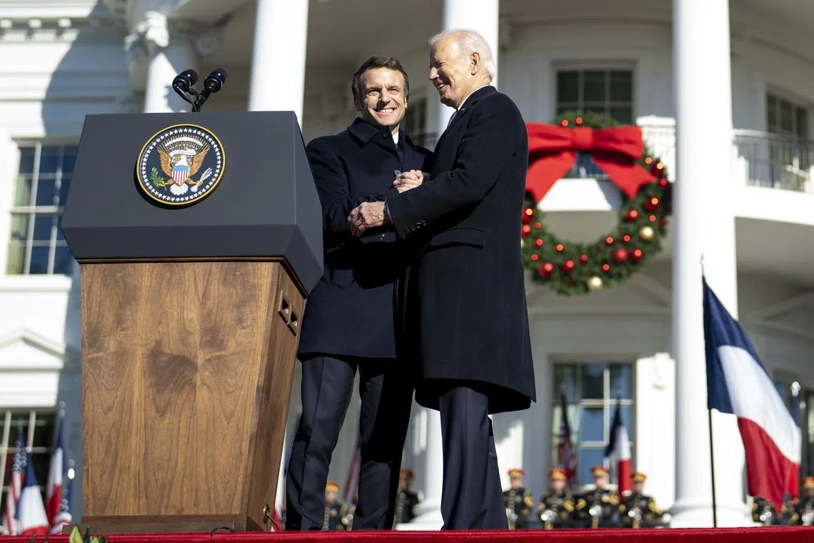 President Emmanuel Macron of France (left) and President Joe Biden during a welcome ceremony at the White House, on Dec 1, 2022.