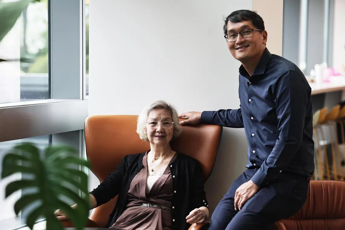 Retired accountant Yeow Ser Kiang (left) with her doctor, NCCS SPRinT head Johnny Ong.