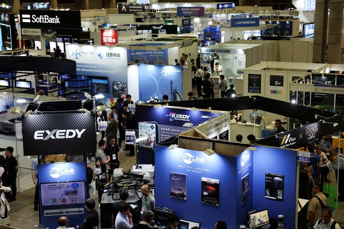 Visitors crowd at the Japan Drone 2026 and International Advanced Air Mobility Expo, in Chiba, Japan.