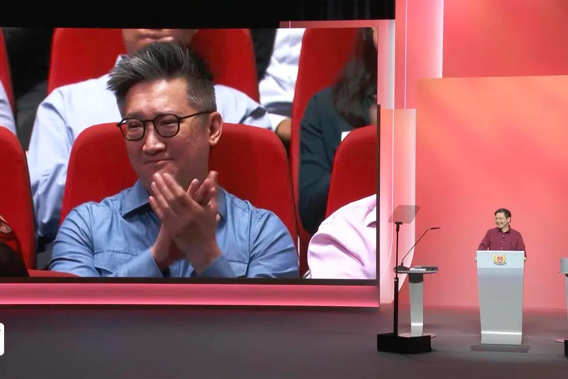 Singaporean film-maker Ervin Han captured on screen looking emotional at the National Day Rally 2026 when Prime Minister Lawrence Wong name-dropped him.