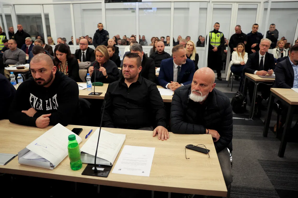 Suspects of the Pulse nightclub fire in Kocani attend a trial at the courthouse in Idrizovo, North Macedonia, November 19, 2025. Thirty seven people have been charged in connection with the fatal disco fire in Kocani in March, which killed 63 people. REUTERS/Valdrin Xhemaj