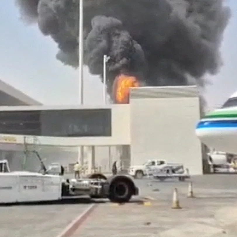 Smoke and flames rising from King Khalid Airport, after Yemen’s Iran-backed Houthis attacked the airport in Riyadh on Oct 8.