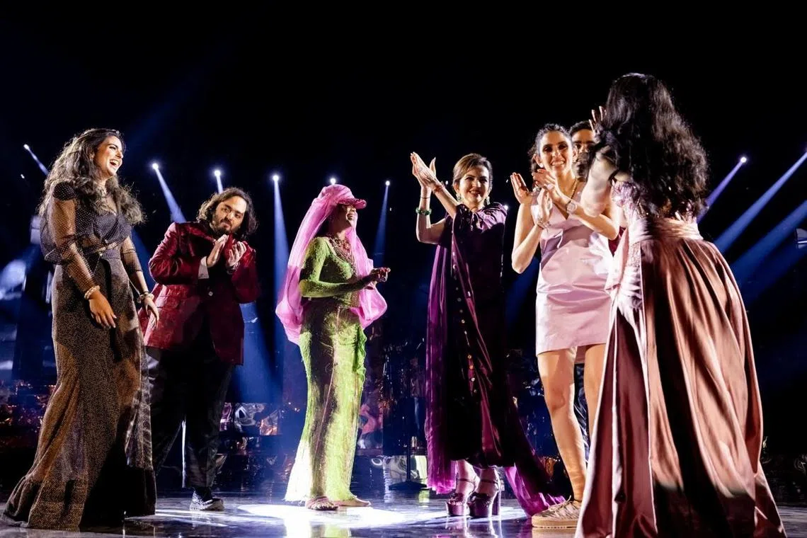 Mr Anant Ambani (second from left) at his pre-wedding celebrations in Jamnagar, India, on March 1, where singer Rihanna (third from left) led the entertainment.