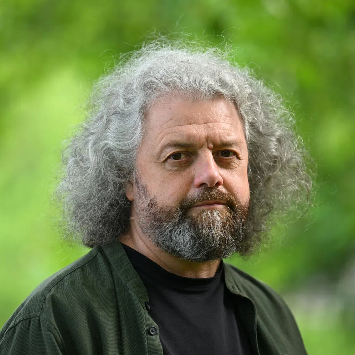 FILE PHOTO: Belarusian poet and publisher Dmitri Strotsev poses for a photo in Berlin, Germany May 27, 2025. REUTERS/Annegret Hilse/File Photo