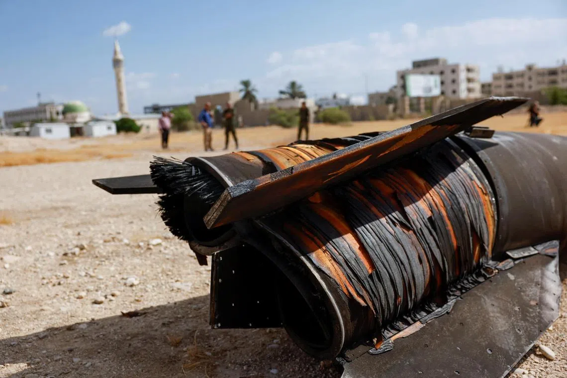 A projectile lying on the ground a day after Iran fired a salvo of ballistic missiles against Israel, in Jericho, in the Israeli-occupied West Bank, on Oct 2.