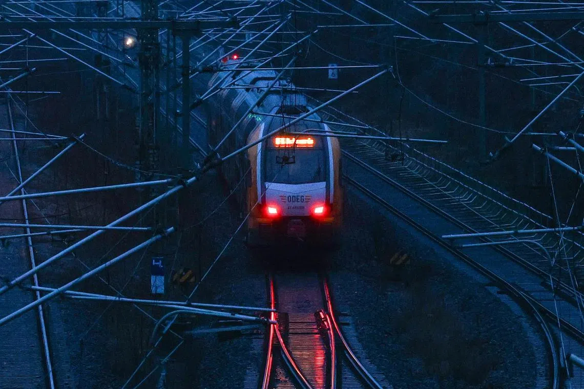 epa11100399 A local train arrives at Suedkreuz station during a German Train Drivers' Union (GDL) strike in Berlin, Germany, 24 January 2024. The GDL called on its members to strike from 24 January 2024 at 2:00 am until 29 January at 17 pm over wages dispute with German rail Deutsche Bahn (DB).  EPA-EFE/FILIP SINGER
