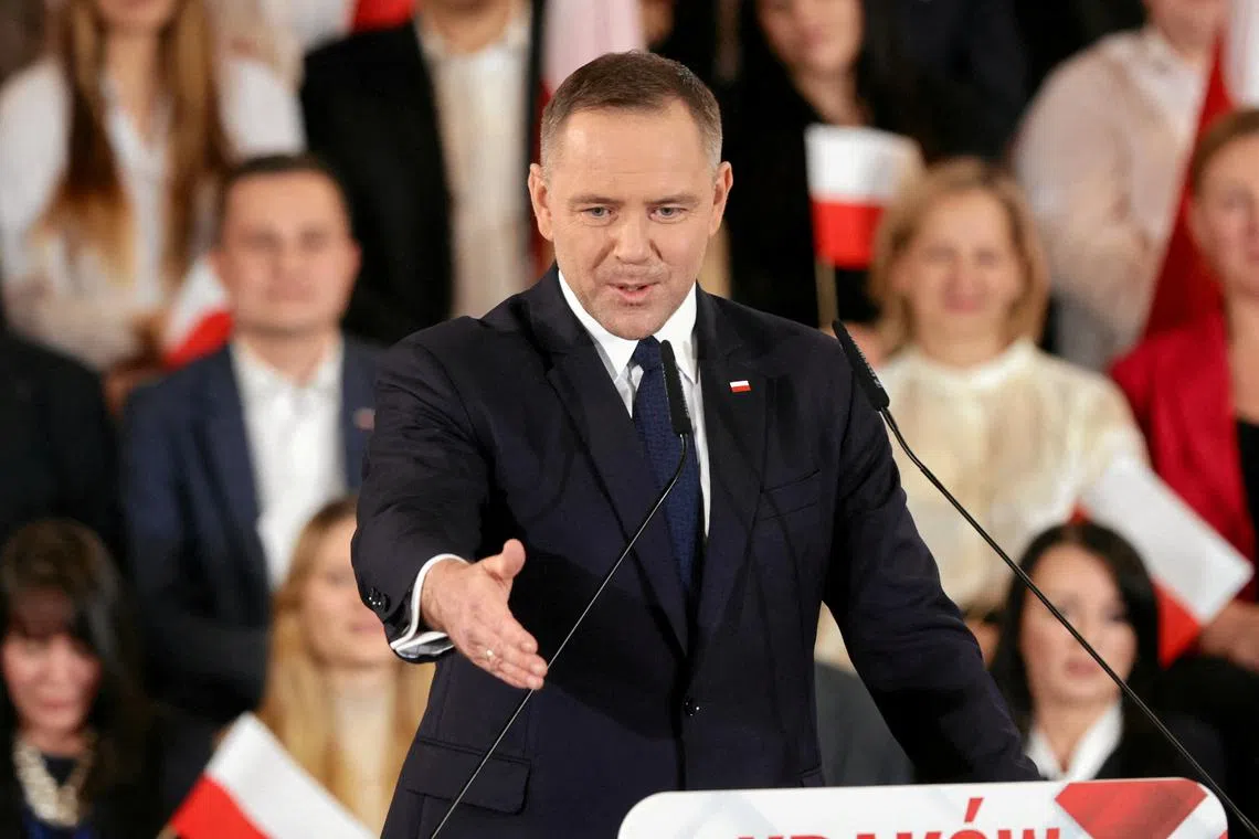 FILE PHOTO: Historian Karol Nawrocki is announced as Poland's main opposition party Law and Justice (PiS) candidate for a presidential election in 2025, during a party convention, in Krakow, Poland November 24, 2024. Jakub Wlodek/Agencja Wyborcza.pl/via REUTERS/File Photo