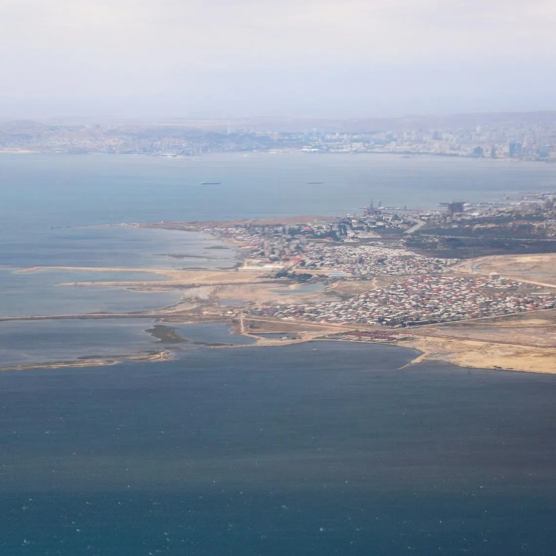 An aerial view of the Caspian Sea near the city of Baku is pictured through the window of Turkish Airlines airplane, ahead of Europa League Final, in Baku Azerbaijan May 27, 2019. REUTERS/Amr Abdallah Dalsh