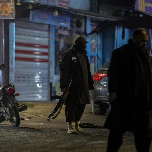 Security forces stand at the site of an explosion in Kabul, Afghanistan, Jan 19, 2026. 