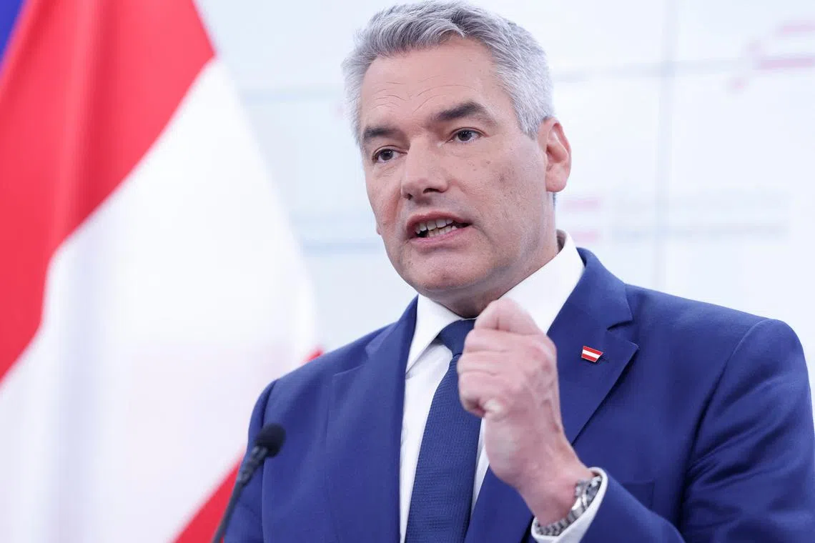 Austrian Chancellor and head of Peoples Party (OEVP) Karl Nehammer addresses the media in Vienna, Austria, October 15, 2024. REUTERS/Leonhard Foeger