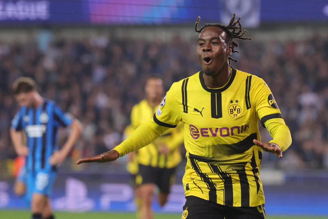Jamie Gittens of Borussia Dortmund celebrates after scoring his second goal against Club Brugge.