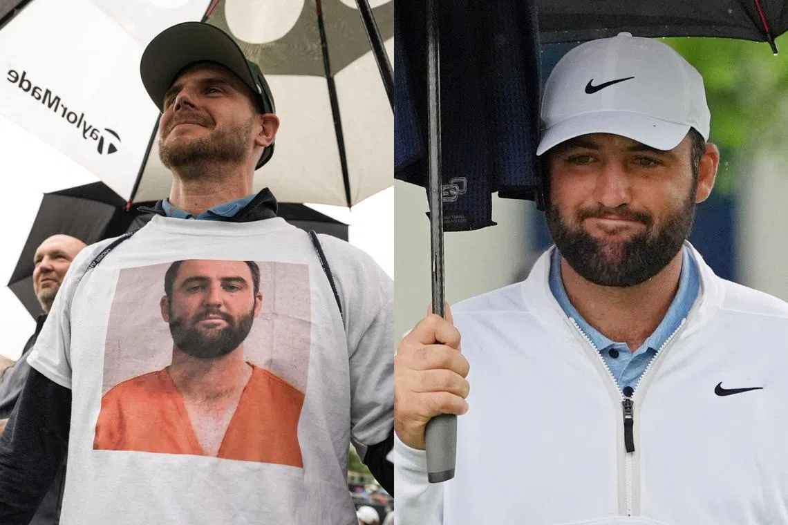 A spectator wears a T-shirt featuring the police mugshot of world number one golfer Scottie Scheffler, following his arrest by Louisville police on May 17.
