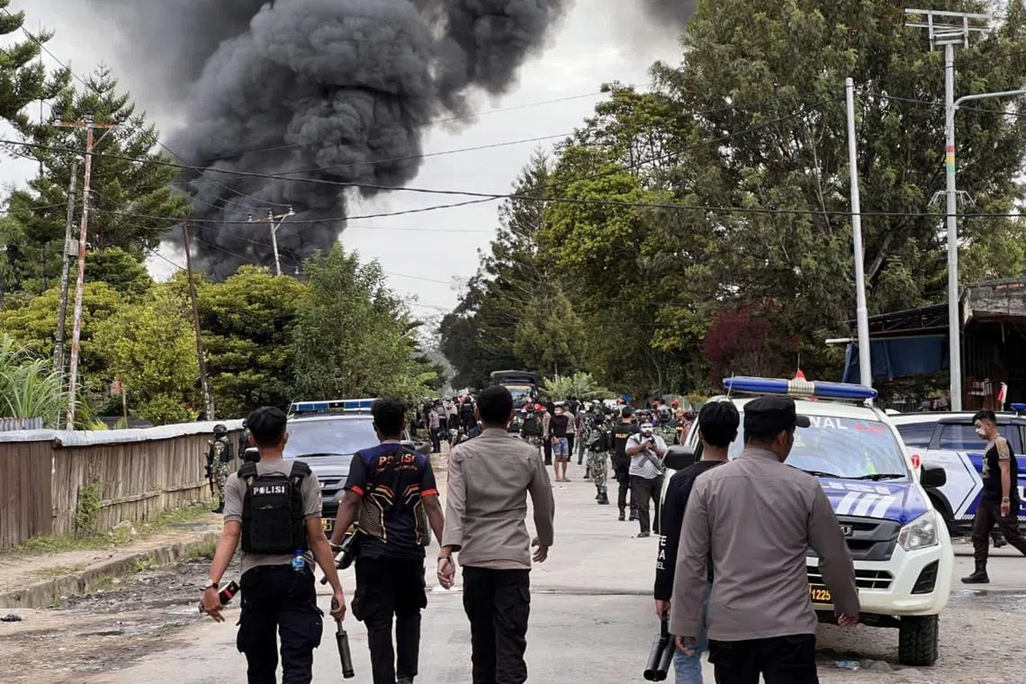 Indonesia tightened security in the town of Wamena in the easternmost region of Papua, after 10 people were killed during a riot triggered by rumours that a child had been kidnapped, an official said on Friday.