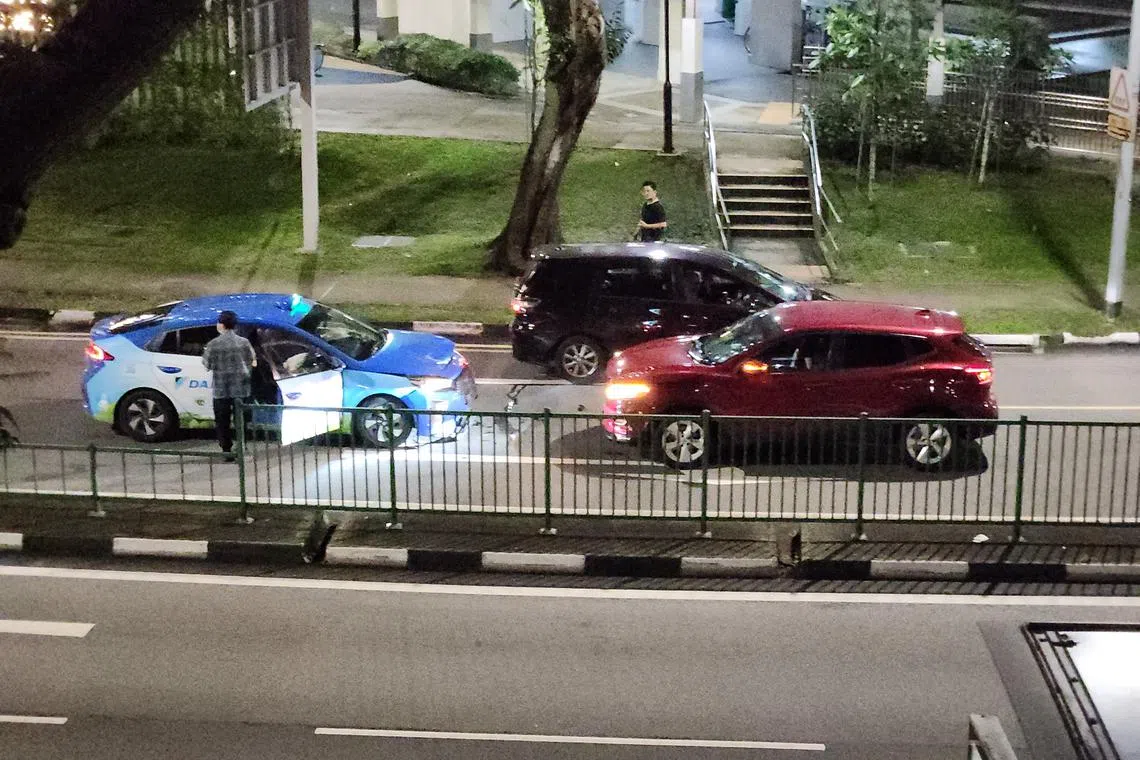 The red Nissan can be seen reversing and driving off after coming into contact with the taxi.