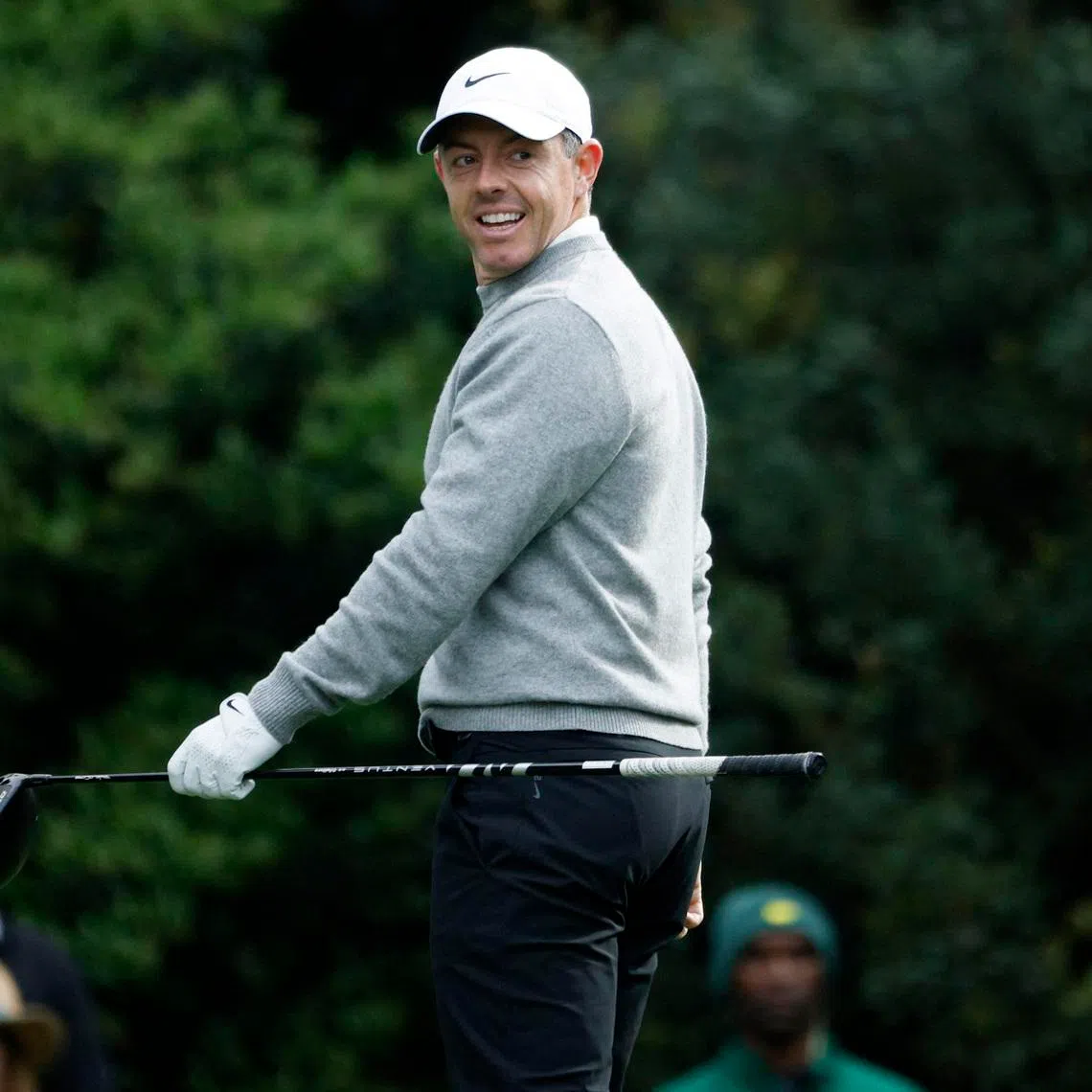 Golf - The Masters - Augusta National Golf Club, Augusta, Georgia, U.S. - April 7, 2026 Northern Ireland's Rory McIlroy reacts after his tee shot on the 11th hole during a practice round REUTERS/Brian Snyder