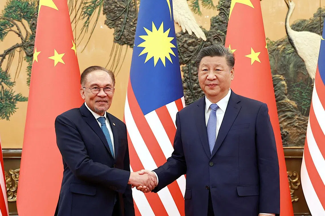 Chinese President Xi Jinping meets Malaysian Prime Minister Anwar Ibrahim at the Great Hall of the People in Beijing, China November 7, 2024. China Daily via REUTERS  ATTENTION EDITORS - THIS IMAGE WAS PROVIDED BY A THIRD PARTY. CHINA OUT.     