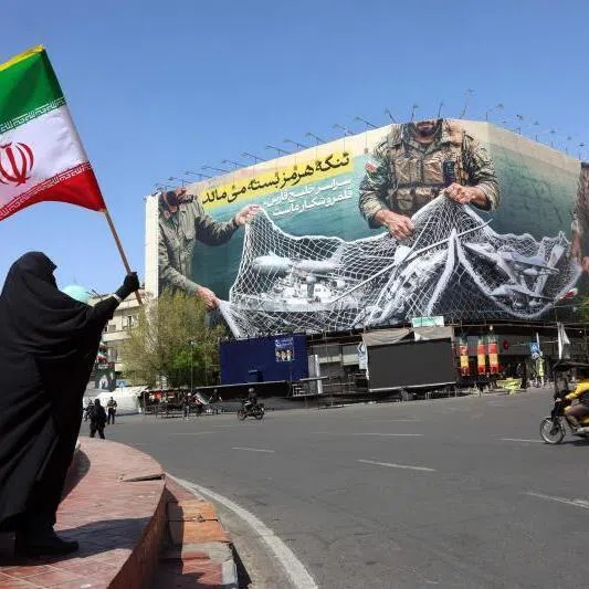 A billboard in Tehran's Enqelab Square asserts Iranian control over the Strait of Hormuz - a stranglehold which would have dire implications for its Arab Gulf neighbours, says the writer.  