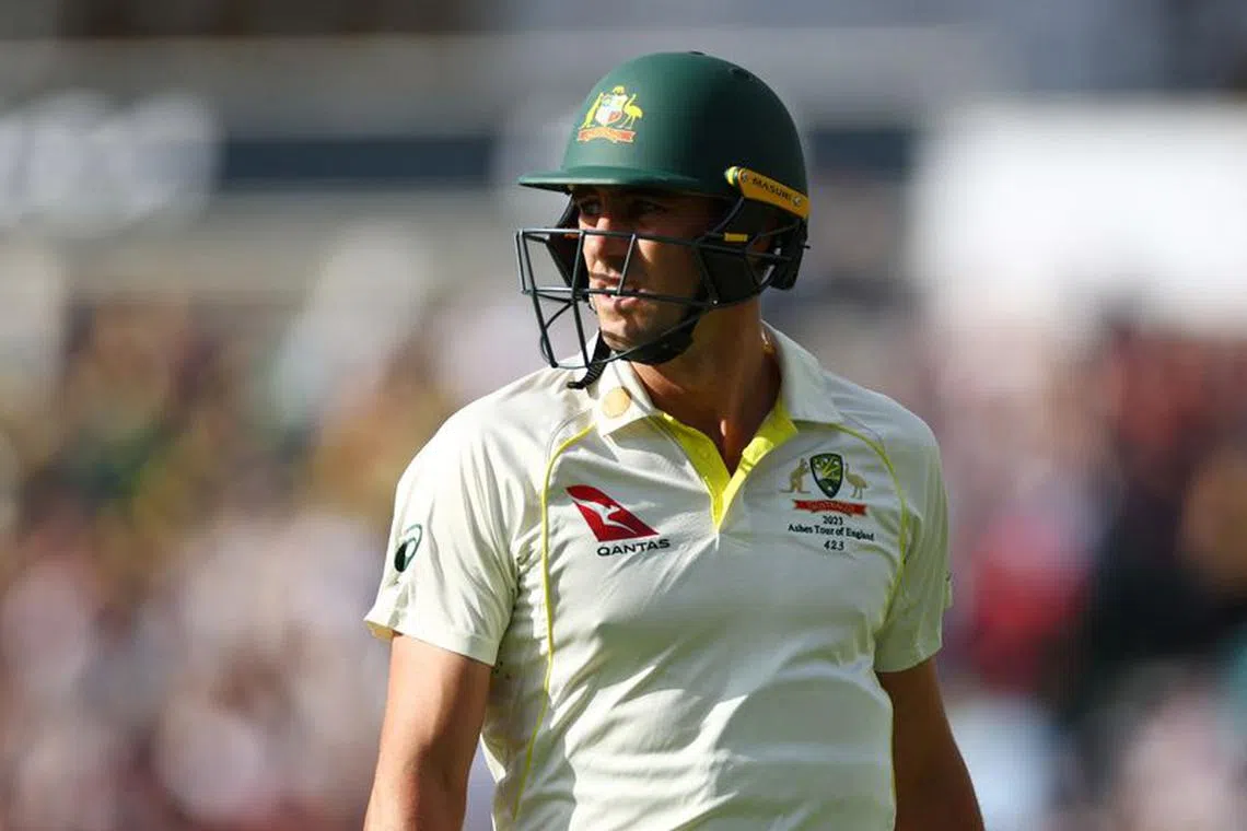 FILE PHOTO: Cricket - Ashes - Fifth Test - England v Australia - The Oval, London, Britain - July 31, 2023 Australia's Pat Cummins walks after losing his wicket, caught by England's Ben Stokes off the bowling of Moeen Ali Action Images via Reuters/Andrew Boyers/File Photo