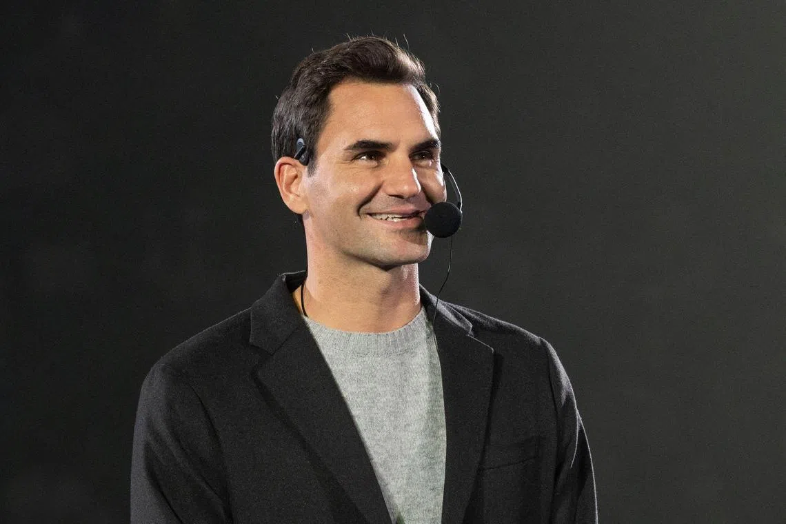 Roger Federer, seen here speaking at a promotional event in Tokyo in November, revealed on American TV programme The Daily Show that he was snubbed by a Wimbledon security guard.