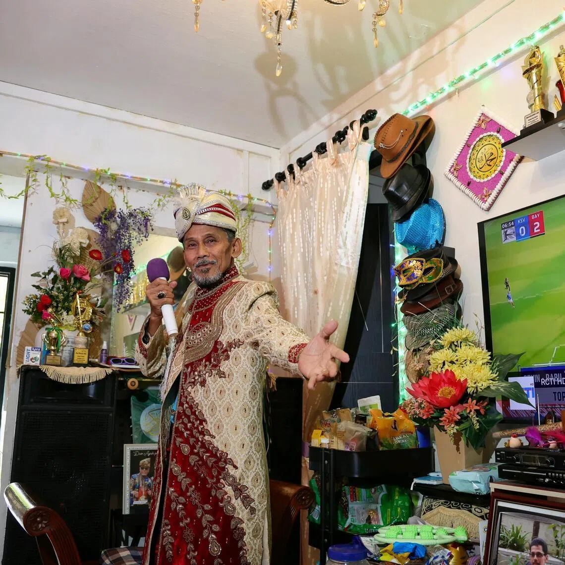 Portrait of Mr Mohamad Sharif Mohamad Akif, 71, an avid karaoke singer and one of the "first generation" citizens who participated in Project Citizens ? a Founders' Memorial initiative to gather stories from Singapore's founding generation, at home on March 9, 2026.