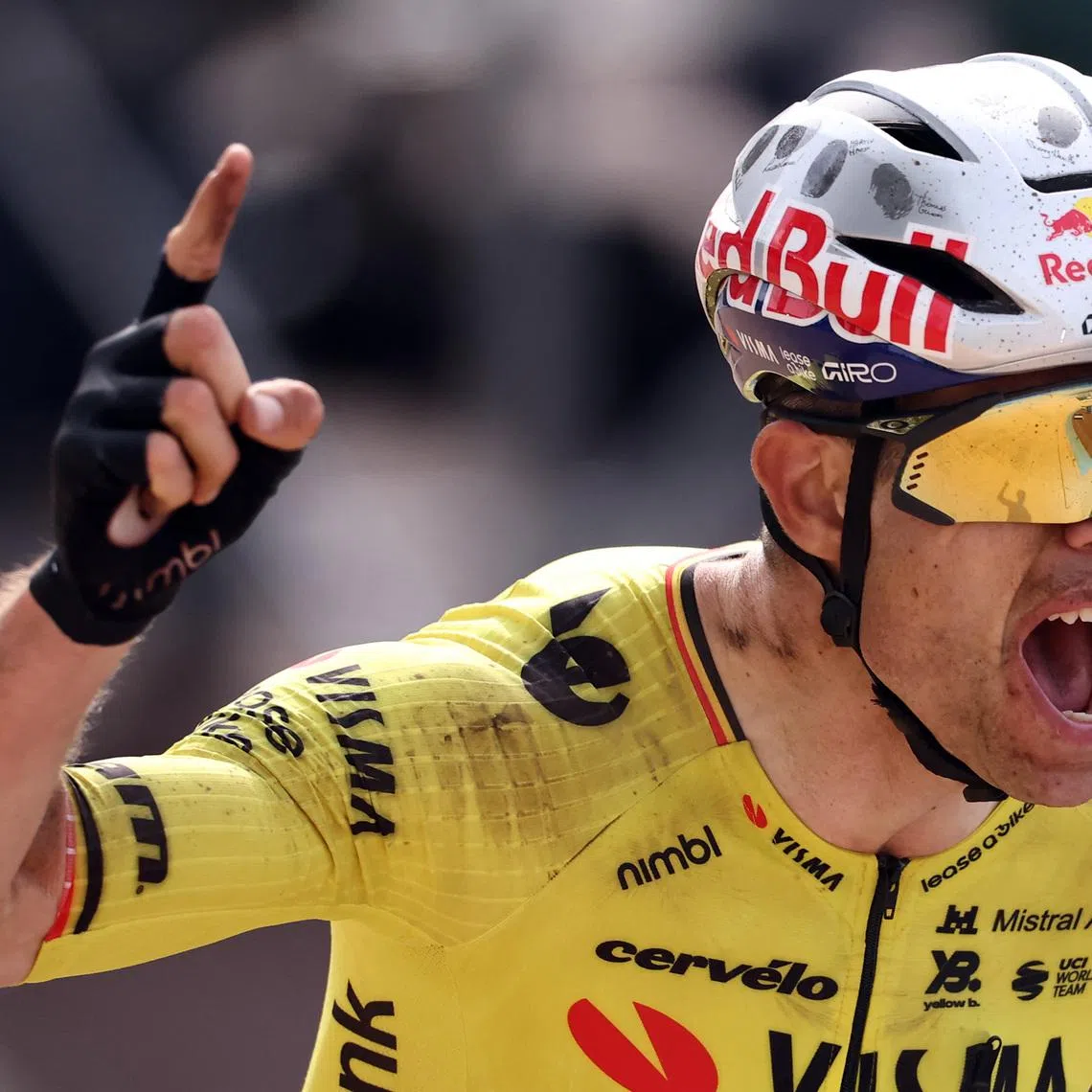Cycling - Paris-Roubaix - Paris, France - April 12, 2026 Team Visma | Lease a Bike's Wout van Aert celebrates after crossing the finish line to win the 2026 Paris-Roubaix REUTERS/Christian Hartmann