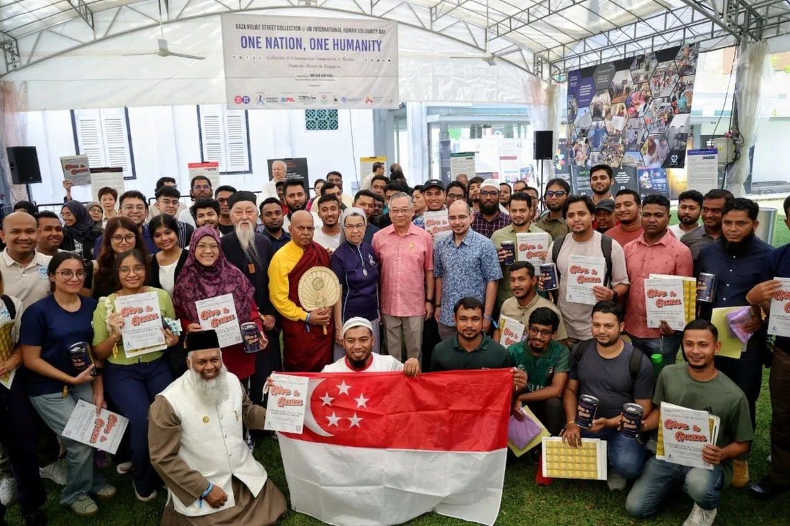 About 200 volunteers hit the streets of Singapore on Dec 20 to raise funds for residents of Gaza