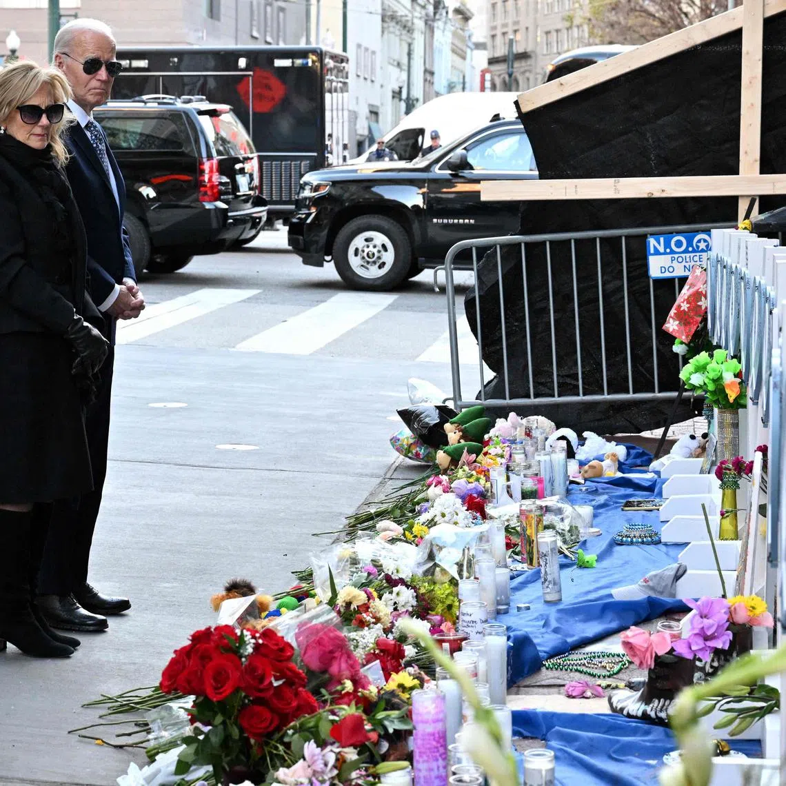 US President Joe Biden and First Lady Jill Biden pay their respects to victims of the Jan 1 truck attack at a makeshift memorial in Bourbon Street in New Orleans, on Jan 6.