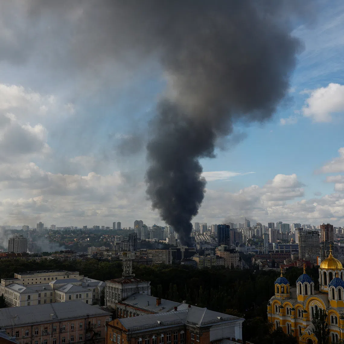 Smoke rises over the city after Russian drone strikes, amid Russia's attack on Ukraine, in Kyiv, Ukraine September 23, 2026. REUTERS/Valentyn Ogirenko