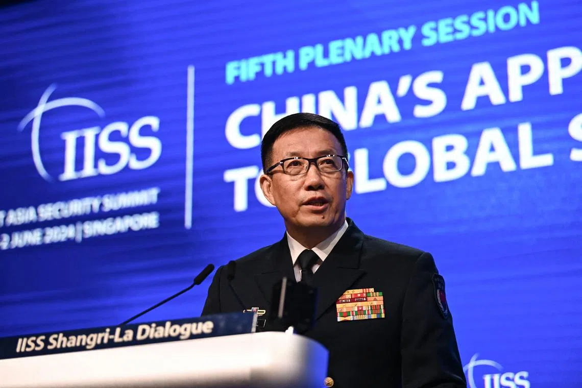 China's Defence Minister Dong Jun speaks during the 21st Shangri-La Dialogue summit at the Shangri-La Hotel in Singapore on June 2, 2024. (Photo by NHAC NGUYEN / AFP)