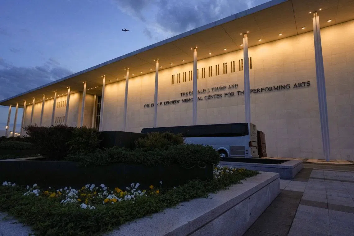 A plane flies by the John F. Kennedy Memorial Center for the Performing Arts, renamed The Donald J. Trump and The John F. Kennedy Memorial Center for the Performing Arts by the Trump administration, in Washington, D.C., U.S., April 23, 2026. REUTERS/Ken Cedeno