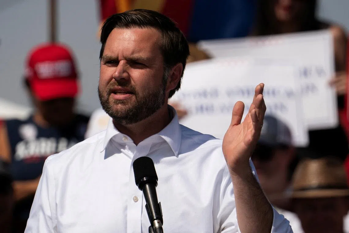 FILE PHOTO: Republican U.S. vice presidential nominee Senator JD Vance speaks at Tucson Speedway in Tucson, Arizona, U.S. October 9, 2024. REUTERS/Go Nakamura/File Photo