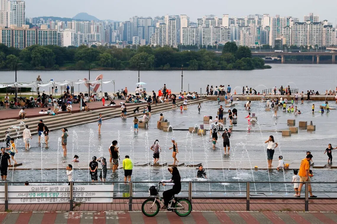 As summer returns in South Korea, so does debate over shirtless runners