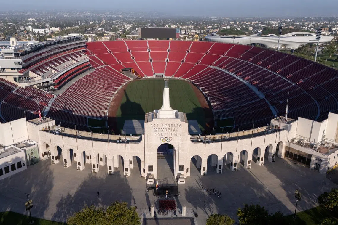 A drone view of Los Angeles Coliseum, as it was announced it will host the opening ceremonies of the 2028 Olympics along with SoFi Stadium in a dual event, closing ceremony, and host the opening of the Paralympic Games in 2028, making it the first facility to host events for 3 Olympic Games in Los Angeles, California, U.S., May 8, 2025. REUTERS/Mike Blake