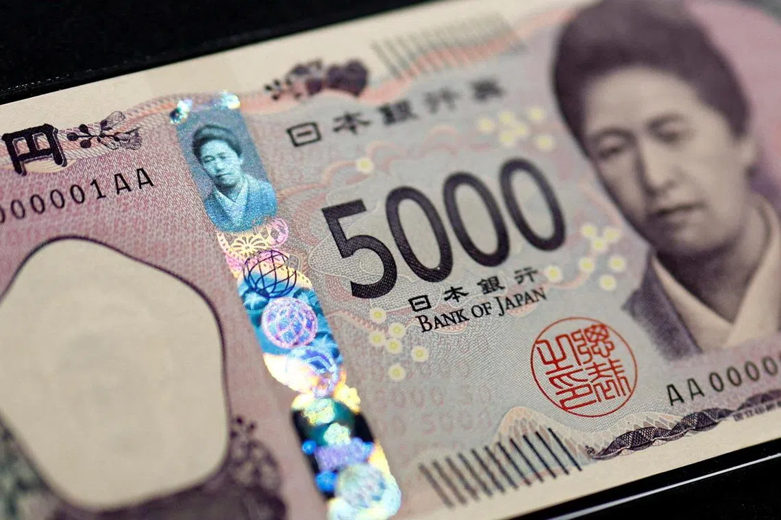 Holograms, which show different images and colours depending on the angle at which they are viewed, are seen on the new Japanese 5,000 yen banknote as the new note is displayed at a currency museum of the Bank of Japan, on the day the new notes of 10,000 yen, 5,000 yen and 1,000 yen went into circulation, in Tokyo, Japan July 3, 2024. REUTERS/Issei Kato/Pool   REFILE - CORRECTING DENOMINATION FROM "10,000" TO "5,000".