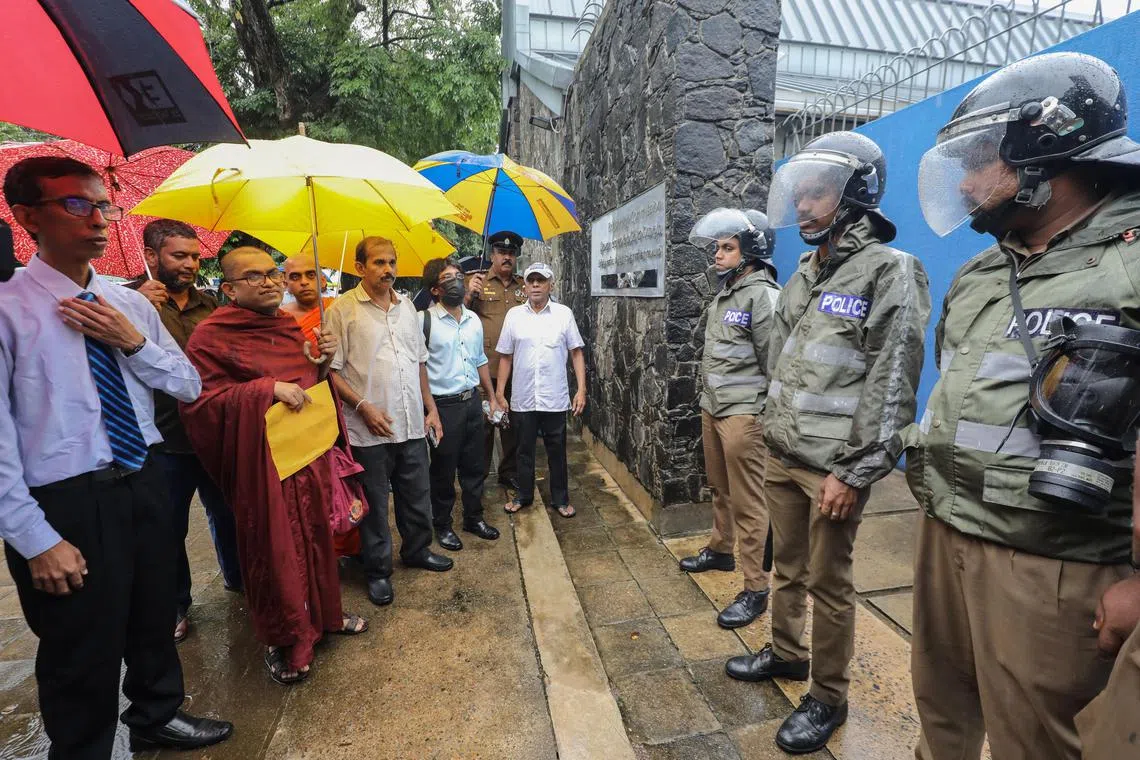 epa10846088 Activists from the Movement for National Building and Reconciliation stage a silent protest against the British Channel 4 channel's recent documentary about the 2019 Easter Sunday Suicide Bomb Attack in front of the British High Commission in Colombo, Sri Lanka, 07 September 2023. They accuse Channel 4 of trying to develop discord between people in the country. Channel 4 British television channel recently broadcast a controversial documentary about the 2019 Easter Sunday suicide bomb attack alleging Sri Lankan former president Gotabaya Rajapaksa, Director of the State Intelligence Service, Major General Suresh Sallay, and State Minister Sivanesathurai Chandrakanthan alias Pillayan hatched the attack, but they deny all the allegations.  EPA-EFE/CHAMILA KARUNARATHNE
