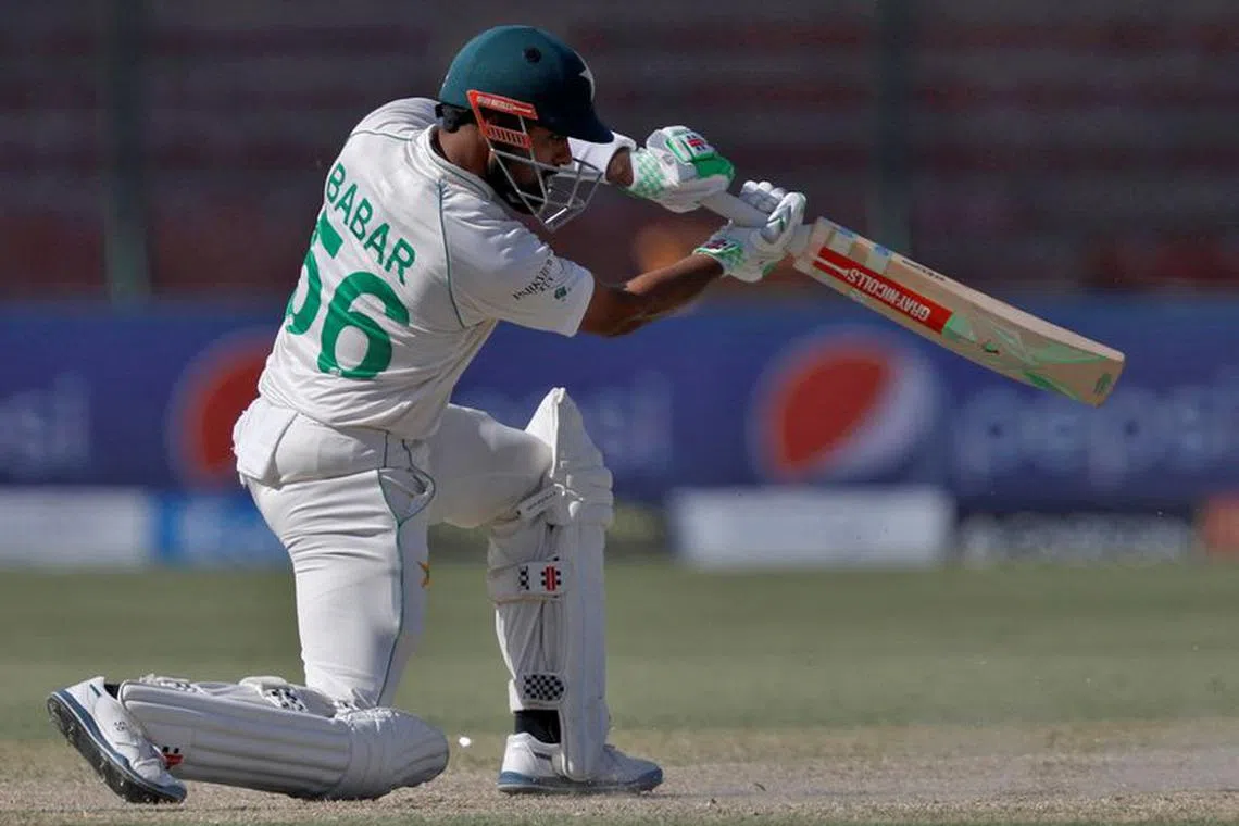 FILE PHOTO: Cricket - Third Test - Pakistan v England - National Stadium Karachi, Pakistan - December 19, 2022. Pakistan's captain Babar Azam plays a shot. REUTERS/Akhtar Soomro/File Photo