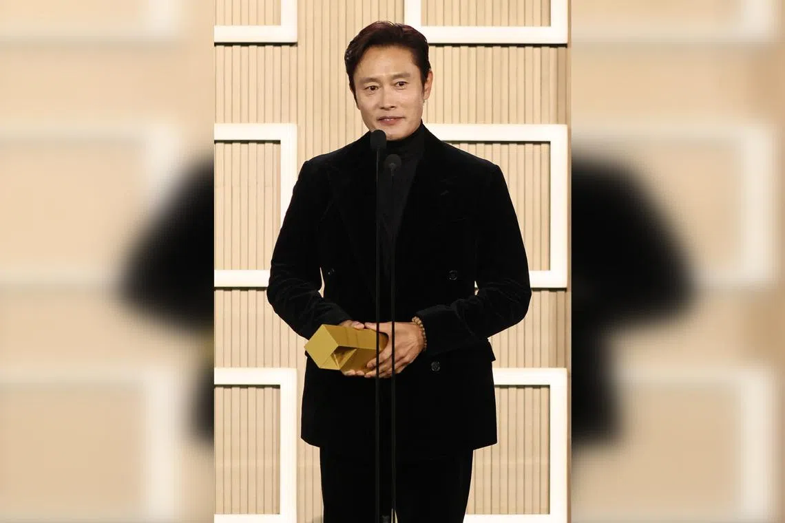 South Korean actor Lee Byung-hun accepting the TIFF Special Tribute Award onstage during the 2025 Toronto International Film Festival on Sept 7.