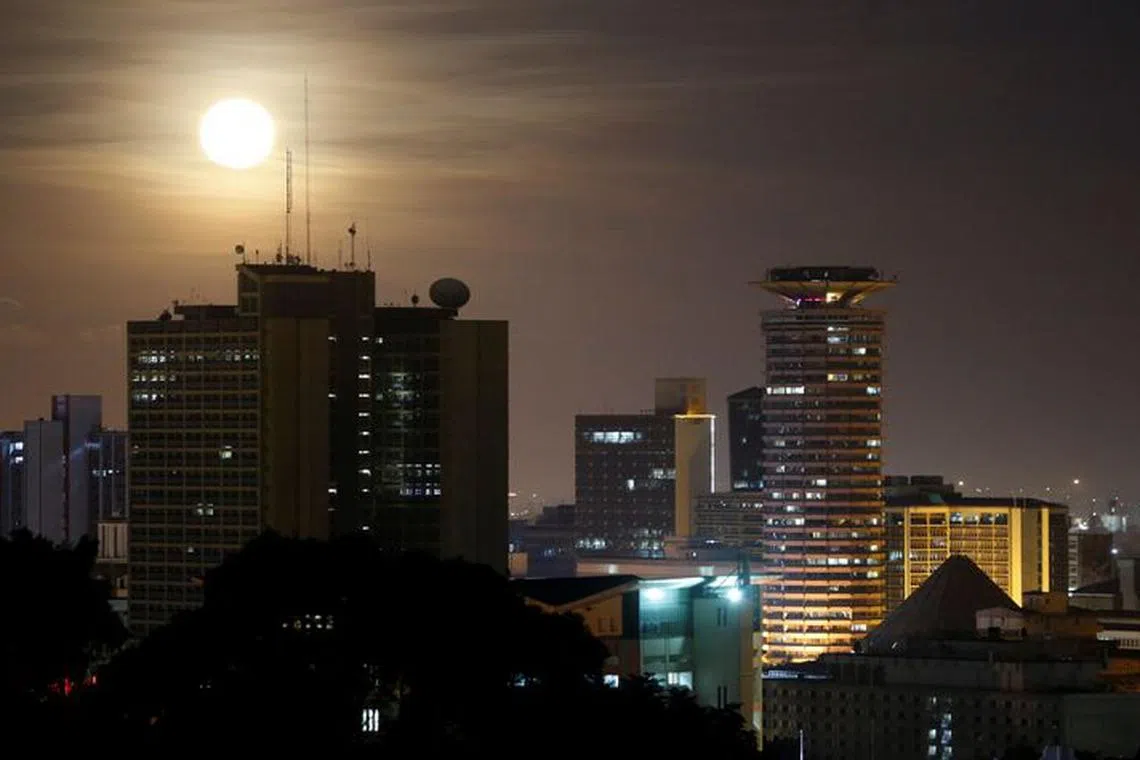 The Pink Supermoon rises over the skyline of Nairobi, Kenya April 8, 2020. REUTERS/Thomas Mukoya/File Photo