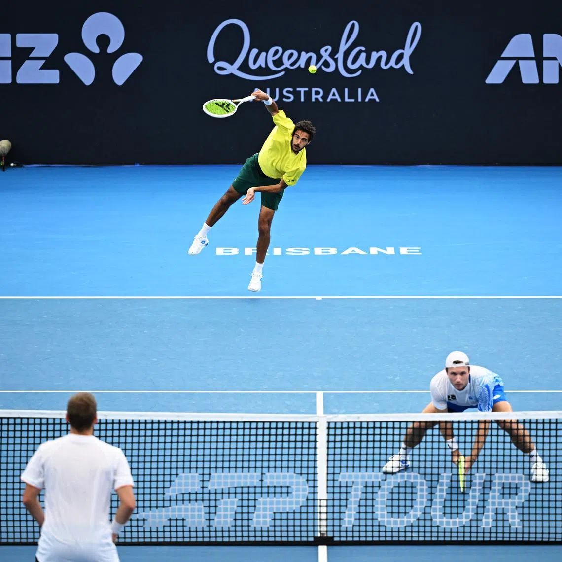 Tennis - Brisbane International Tennis Tournament - Pat Rafter Arena, Brisbane, Australia - January 11, 2026 Portugal's Francisco Cabral and Austria's Lucas Miedler in action during their men's doubles final against Britain's Julian Cash and Britain's Lloyd Glasspool REUTERS/Dan Peled