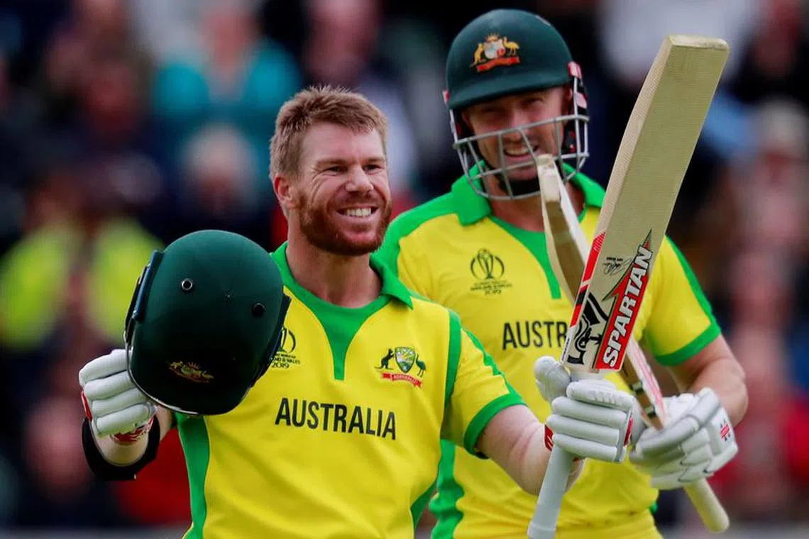 FILE PHOTO: Cricket - ICC Cricket World Cup - Australia v Pakistan - The County Ground, Taunton, Britain - June 12, 2019   Australia's David Warner celebrates his century   Action Images via Reuters/Andrew Couldridge/File Photo