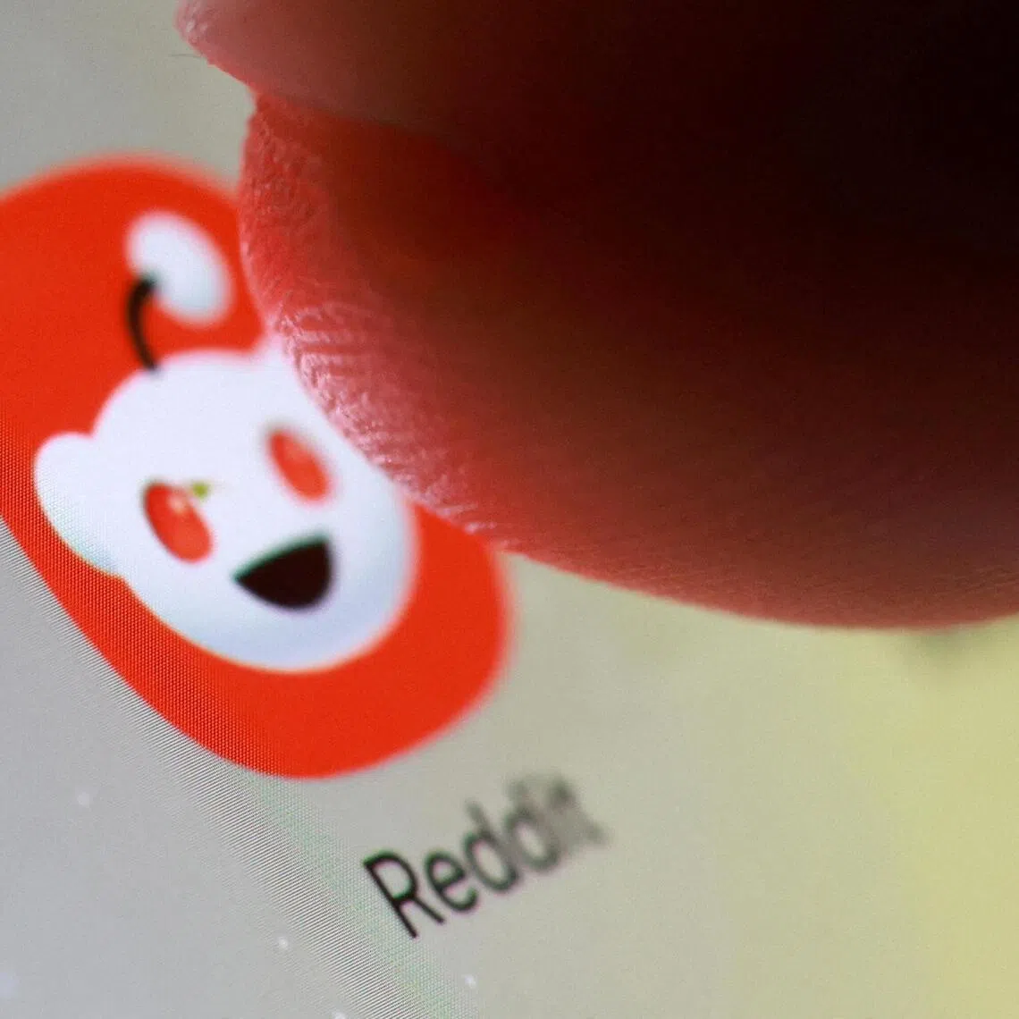 FILE PHOTO: The Reddit app icon on a smartphone in this illustration taken October 27, 2025. REUTERS/Dado Ruvic/Illustration/File Photo