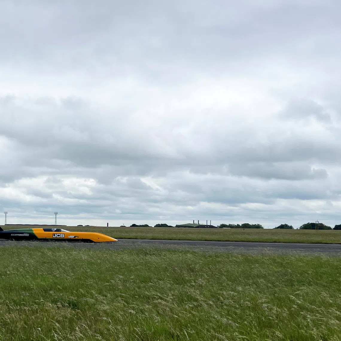 The Hydrogen-powered JCB Hydromax car on the runway during runway testing at RAF Wittering in Britain, on June 17.