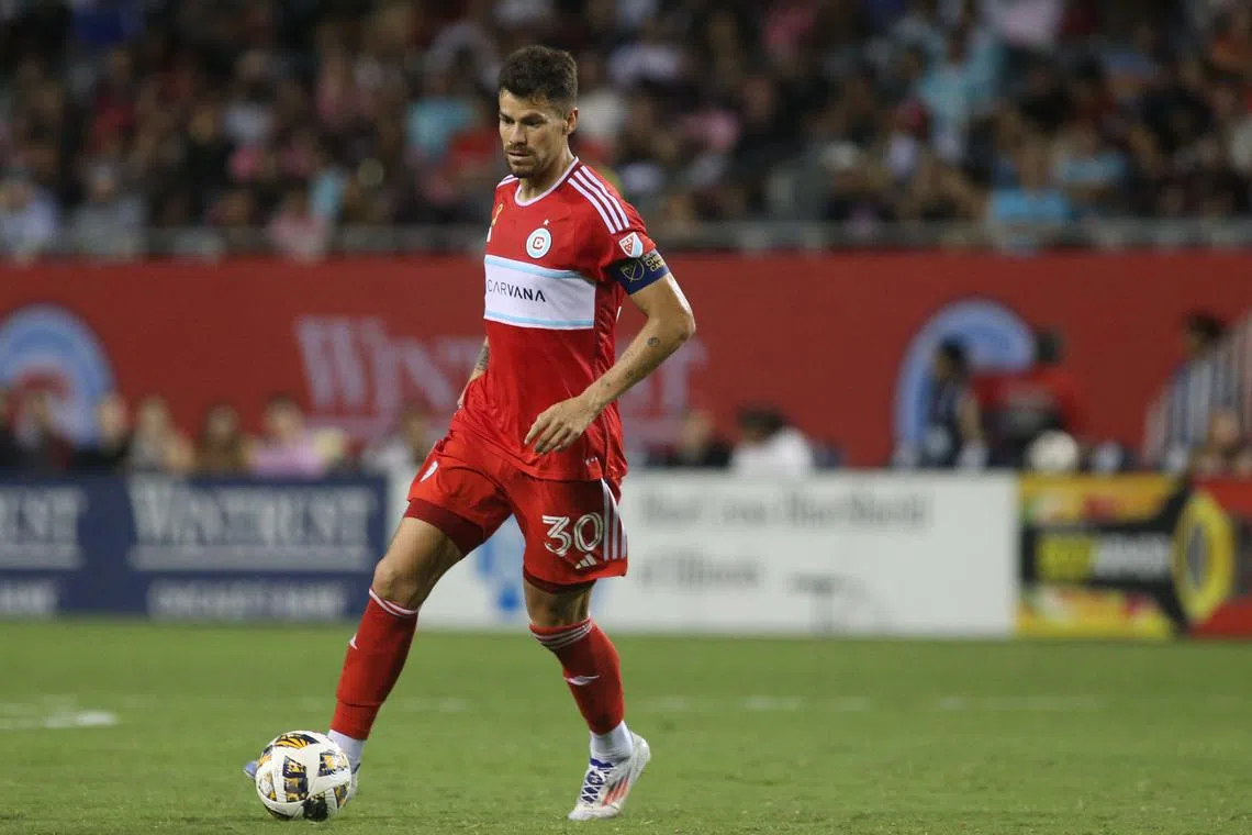 FILE PHOTO: Aug 31, 2024; Chicago, Illinois, USA; Chicago Fire FC midfielder Gaston Gimenez (30) dribbles a ball upfield during the second half at Soldier Field. Mandatory Credit: Talia Sprague-USA TODAY Sports/File Photo