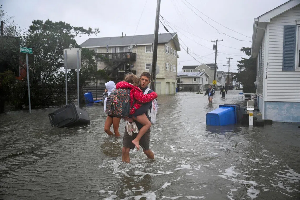 Flights cancelled, thousands without power as powerful storm pummels US Northeast