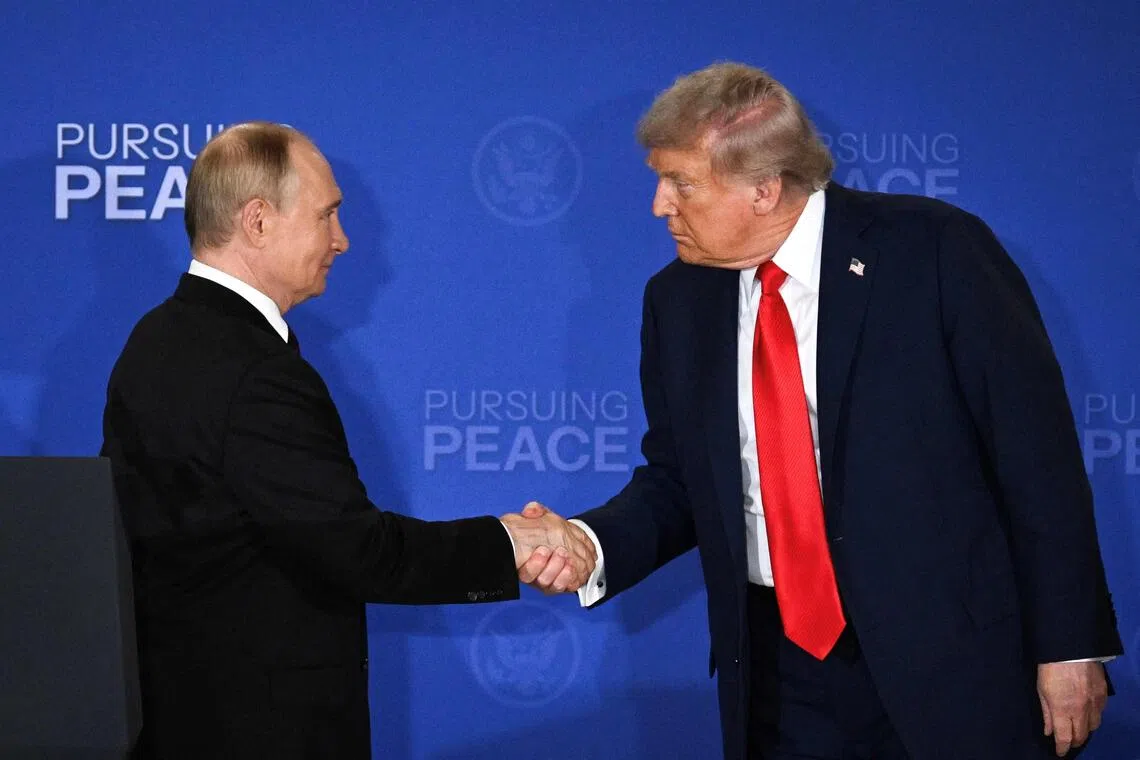 Mr Trump (right) said the meeting with Mr Putin (left) could take place within two weeks, though that timeline appears to be slipping away.