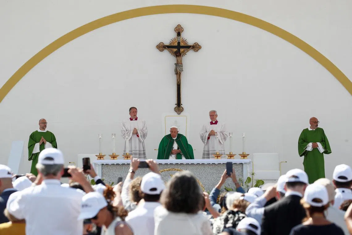 Pope Francis attends a mass at Piazza Unita d'Italia in Trieste, Italy, July 7, 2024. REUTERS/Alessandro Garofalo